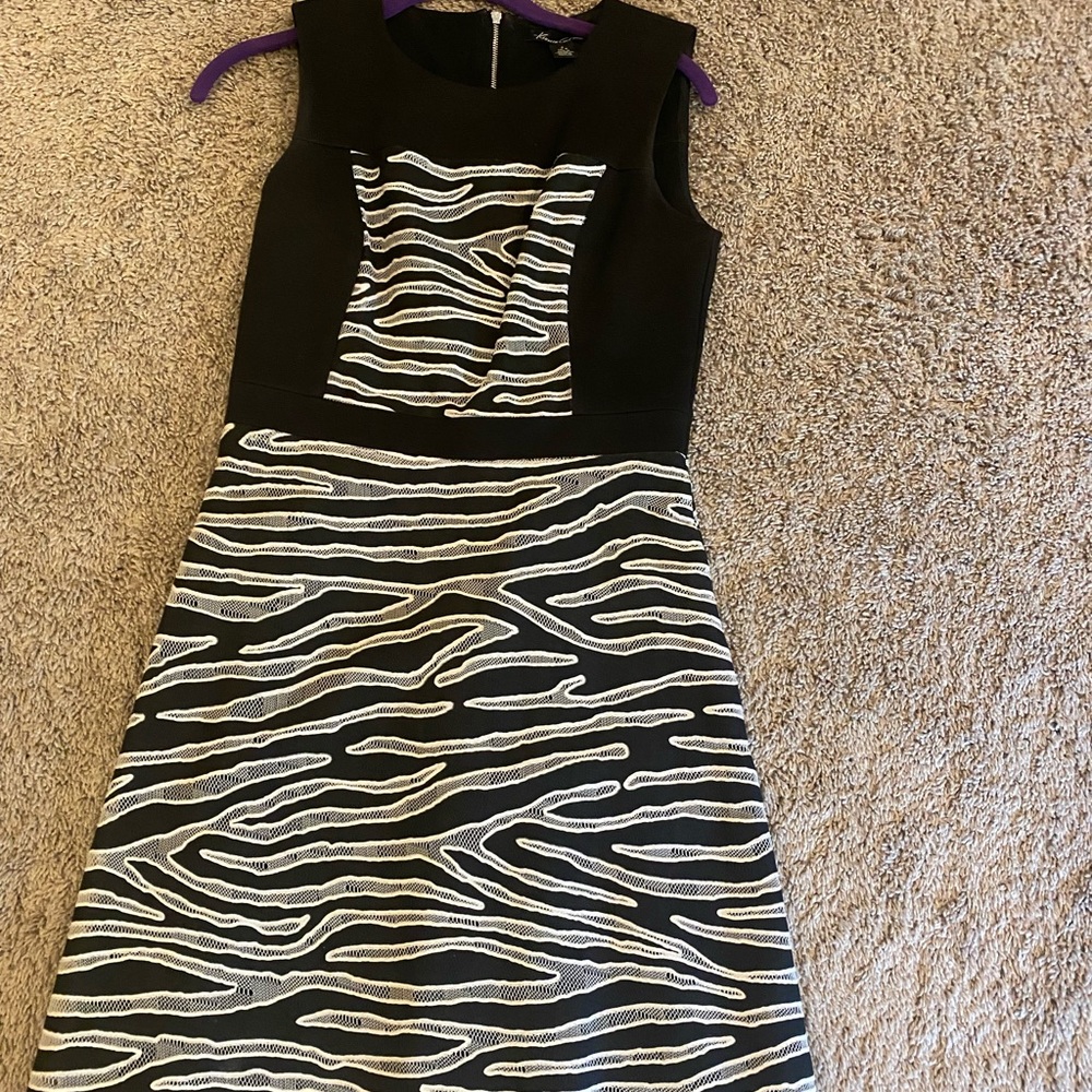 Beautiful black and white dress.